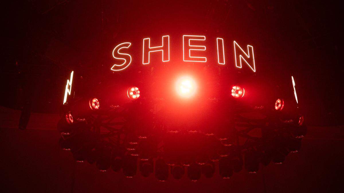 A picture shows the logo Shein during the Urban Ritual fashion show Fall-Winter 2025/26 organized by Chinese fashion giant Shein in Milan, on October 16, 2025. (Photo by Piero CRUCIATTI / AFP) (Photo by PIERO CRUCIATTI/AFP via Getty Images)