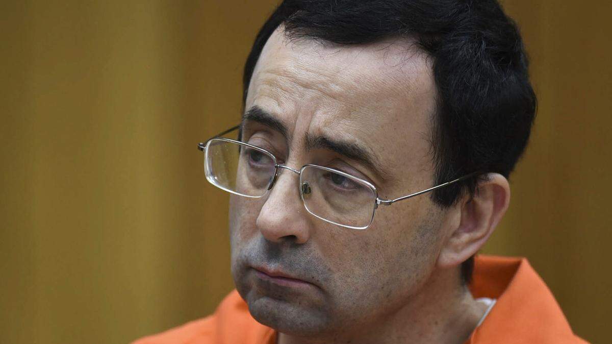 Larry Nassar listens as Rachael Denhollander gives her victim impact statement Feb. 2 in Eaton County Circuit Court.

News Eaton County Larry Nassar Sentencing
