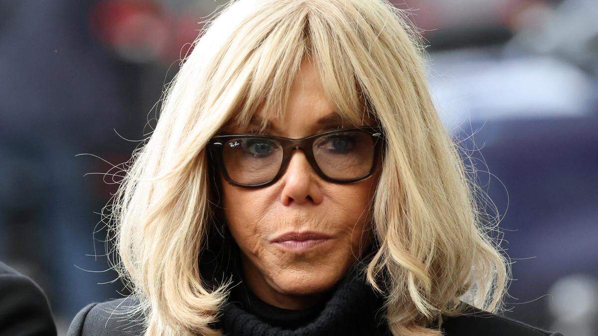 French President's wife Brigitte Macron arrives ahead of the ceremony outside "La Belle Equipe" bar in Paris on November 13, 2025 during ceremonies across Paris marking a decade since the terror attacks of November 13, 2015 in which 130 civilians were killed. (Photo by Ludovic MARIN / POOL / AFP via Getty Images)