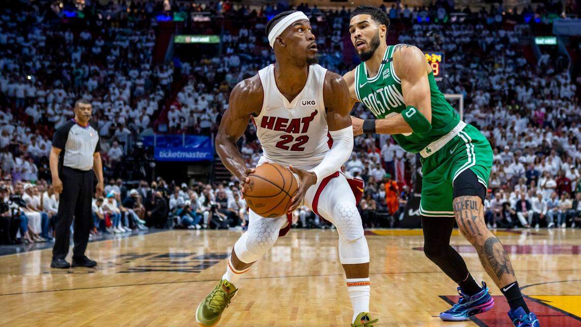 Miami Heat star Jimmy Butler battles Boston’s Jayson Tatum in the NBA playoff series now tied 1-1 entering Game 3 Satyurday night in Boston. Butler is having to do too much and needs teammates to step up offensively.
