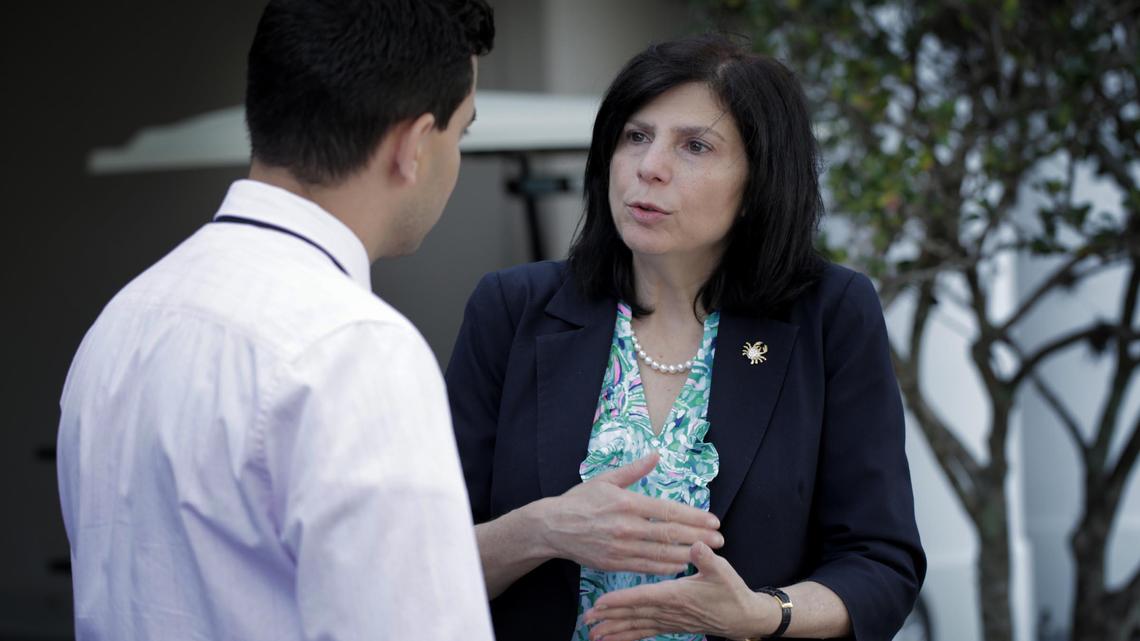 The Chargé d’affaires of the United States Embassy in Havana, Mara Tekach, right, talks to Mario Penton, a journalist for el Nuevo Herald, during an interview at the Miami Herald Media office in Doral, Florida.