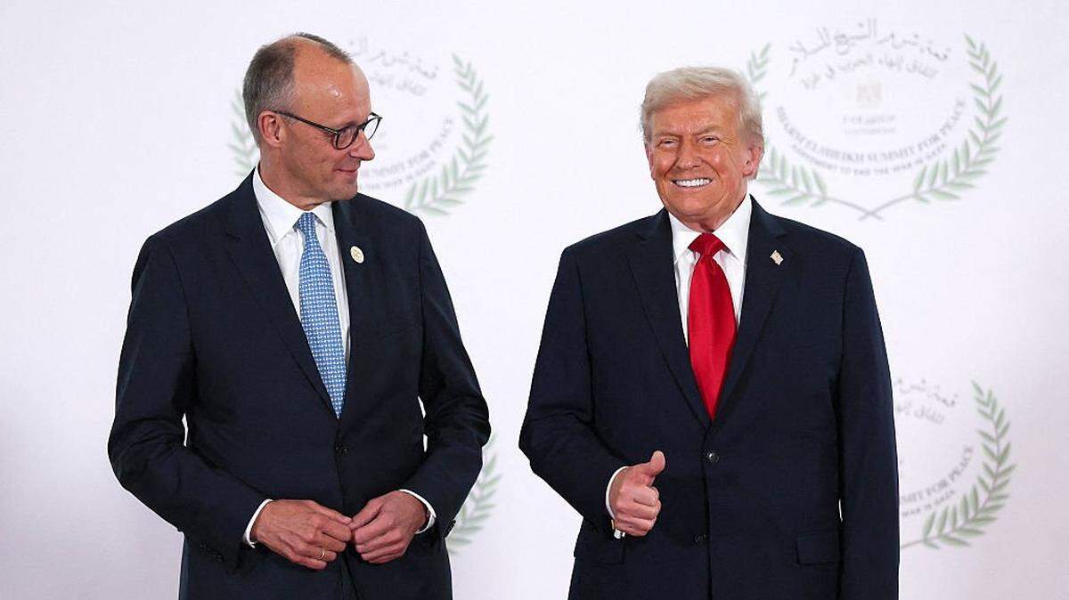 SHARM EL-SHEIKH, EGYPT - OCTOBER 13: U.S. President Donald Trump and German Chancellor Friedrich Merz pose for a photo during a world leaders' summit on ending the Gaza war on October 13, 2025 in Sharm El-Sheikh, Egypt. President Trump is in Egypt to meet with European and Middle Eastern leaders in what's being billed as an international peace summit, following the start of a US-brokered ceasefire deal to end the war in the Gaza Strip. (Photo by Suzanne Plunkett - Pool / Getty Images)
