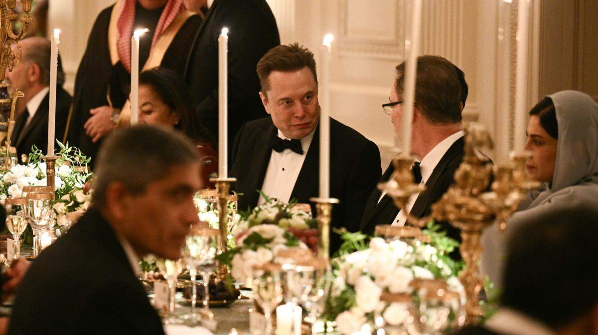 CEO of SpaceX and Tesla, South African-Canadian-US businessman Elon Musk, attends an official dinner with US President Donald Trump and Crown Prince and Prime Minister of the Kingdom of Saudi Arabia Mohammed bin Salman in the East Room of the White House in Washington, DC on November 18, 2025. (Photo by Brendan SMIALOWSKI / AFP) (Photo by BRENDAN SMIALOWSKI/AFP via Getty Images)