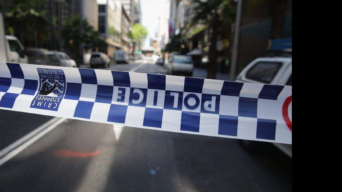 La policía cierra parte del centro de Sídney, Australia, por aparente toma de rehenes el domingo diciembre 14 de 2014.