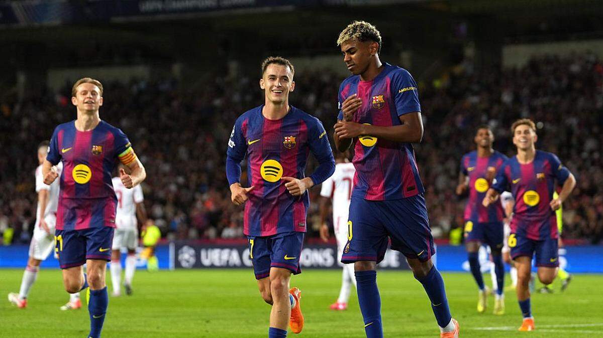 BARCELONA, SPAIN - OCTOBER 21: Lamine Yamal of FC Barcelona celebrates after scoring his team's third goal from the penalty spot during the UEFA Champions League 2025/26 League Phase MD3 match between FC Barcelona and Olympiacos FC at Estadi Olimpic Lluis Companys on October 21, 2025 in Barcelona, Spain. (Photo by Alex Caparros/Getty Images)