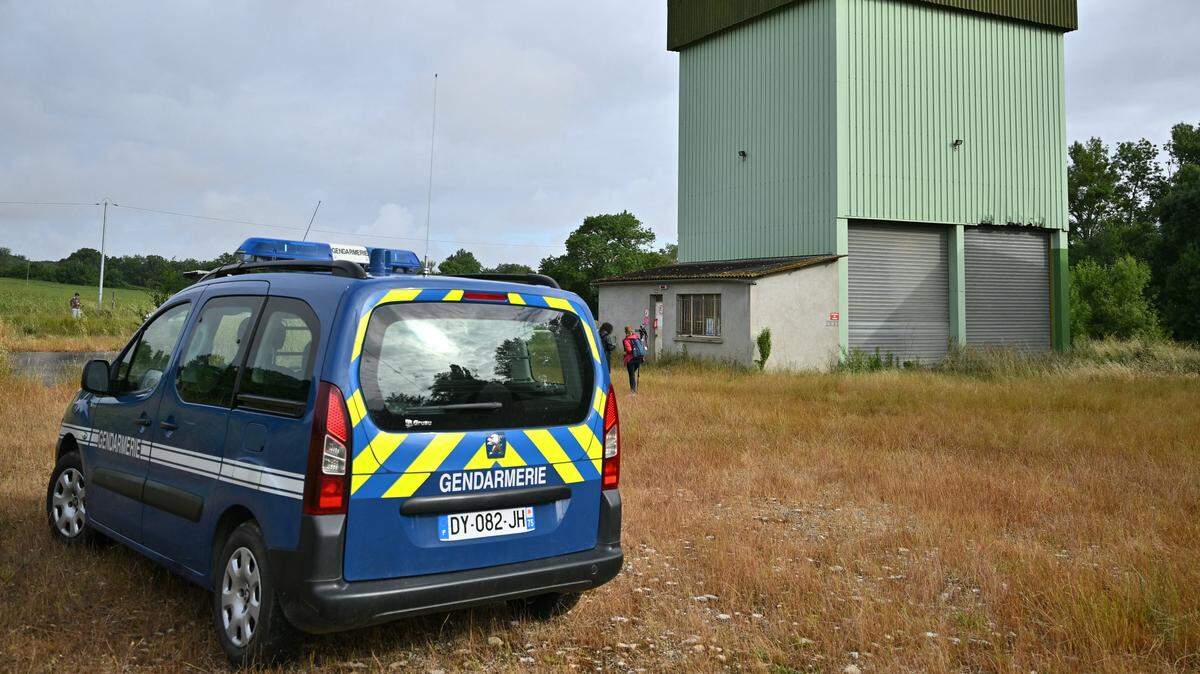 A Gendarmerie car is parked in front of the agricultural silo where search teams found the body of a child believed to be Lyhanna, an 11-year-old schoolgirl missing since May 29, 2026, in Puycasquier , southwestern France, on June 5, 2026. Outrage has erupted in France after it emerged the main suspect in the case of an 11-year-old girl missing since last week had been repeatedly accused of sexually abusing children but no action was taken to protect others. Formal identification is underway. Lyhanna was last seen after getting into a man's car in front of her middle school in Fleurance. (Photo by Lionel BONAVENTURE / AFP via Getty Images)