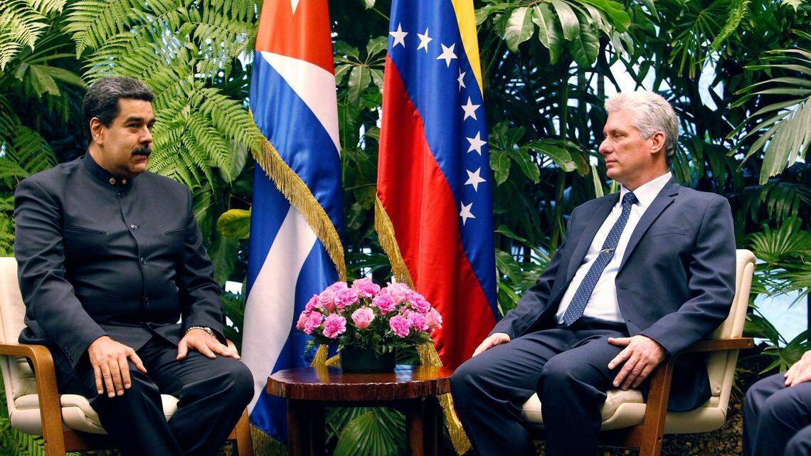 Cuban leader Miguel Diaz-Canel (right) and Venezuela’s Nicolás Maduro are shown in the Palace of the Revolution in Havana in April 2018.