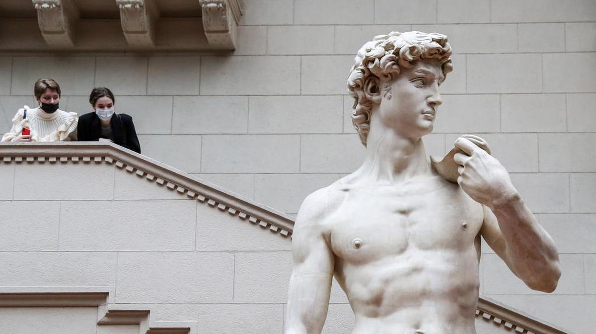 Women look at a plaster cast of Michelangelo’s “David” at the Pushkin State Museum of Fine Arts, in Moscow, Russia. The real statue, in Florence, Italy, was the source of controversy when a Florida teacher showed the image to her class.