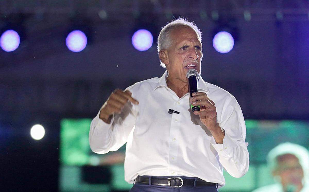 Honduran presidential candidate and businessman Nasry Asfura, of the National Party, speaks during his campaign closing rally in Tegucigalpa on November 22, 2025. Hondurans will head to the polls on November 30 to elect a president, 128 members of the National Congress, 298 mayors, and 20 representatives to the Central American Parliament. (Photo by EMILIO FLORES / AFP via Getty Images)
