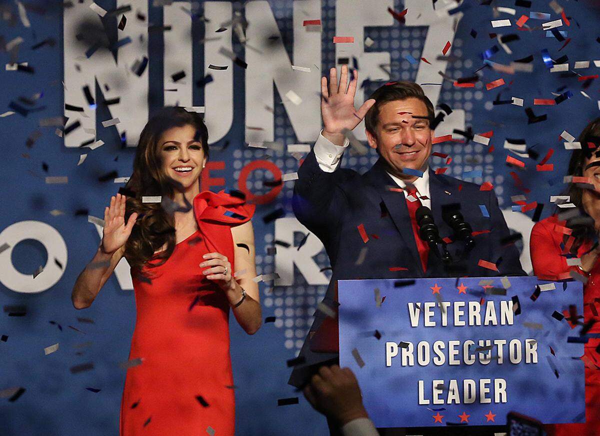 Ron DeSantis and his wife, Casey, celebrate after winning the Florida Governor’s race at the Rosen Centre in Orlando on Tuesday, Nov. 6, 2018.