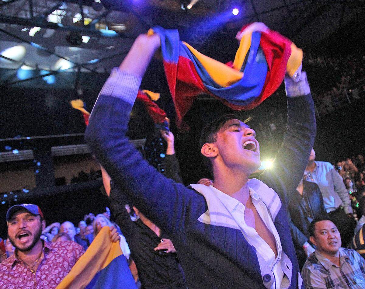 William Badell celebra el triunfo de la representante de Venezuela en las competencias preliminares del Miss Universo en Miami en enero del 2015.