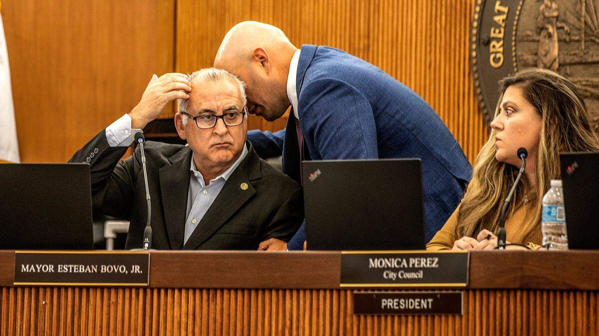 City of Hialeah Mayor Esteban Bovo Jr. exchanges with councilman Jesus Tundidor, during a tense council meeting to discuss a possible annexation by Hialeah of part of Brownsville, a historic Black neighborhood in Miami-Dade County, on Tuesday April 25 2023.