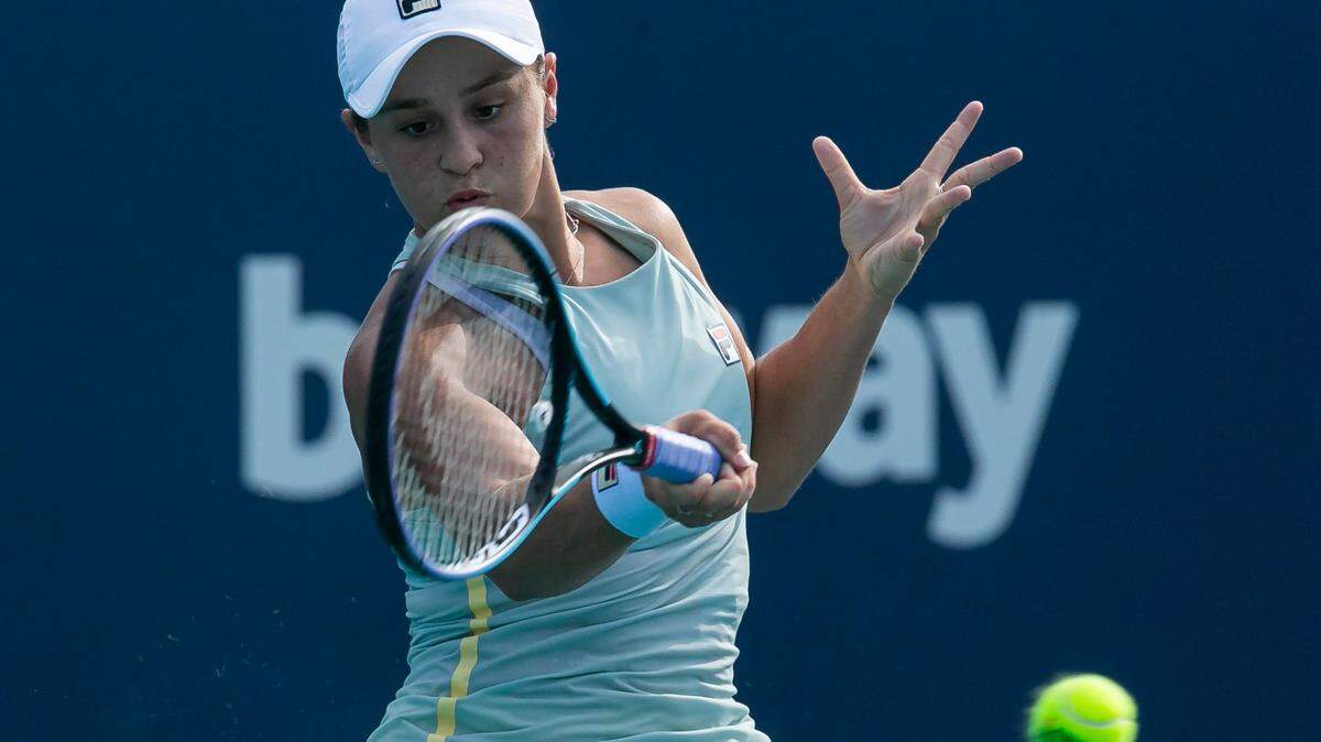 Ashleigh Barty of Australia returns a shot to Elina Svitolina of Ukraine during their match at the Miami Open tennis tournament on Thursday, April 1, 2021 at Hard Rock Stadium in Miami Gardens, Florida.