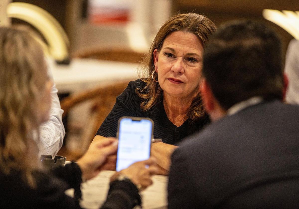 Vivian Casals-Muñoz speaks with Chief of Staff Ismare Monreal, left, and Miami-Dade County Commissioner Kevin Cabrera after learning she had lost the Group IV Hialeah City Council race to Angélica Pacheco, Tuesday, November 7, 2023.