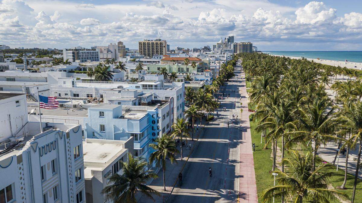 The Miami Lakes-based Commercial Real Estate Women will discuss market conditions for hotel acquisitions during COVID-19. Above: Aerial view of Ocean Drive in Miami Beach on Saturday, May 16, 2020.