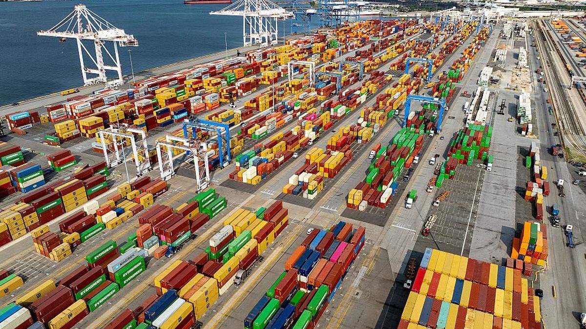 An aerial view of shipping containers at the Port of Baltimore in Baltimore, Maryland, on August 7, 2025. Higher US tariffs came into effect for dozens of economies on August 7, drastically raising the stakes in President Donald Trump's wide-ranging efforts to reshape global trade. As an executive order signed last week by Trump took effect, US duties rose from 10 percent to levels between 15 percent and 41 percent for a list of trading partners. (Photo by Jim WATSON / AFP) (Photo by JIM WATSON/AFP via Getty Images)