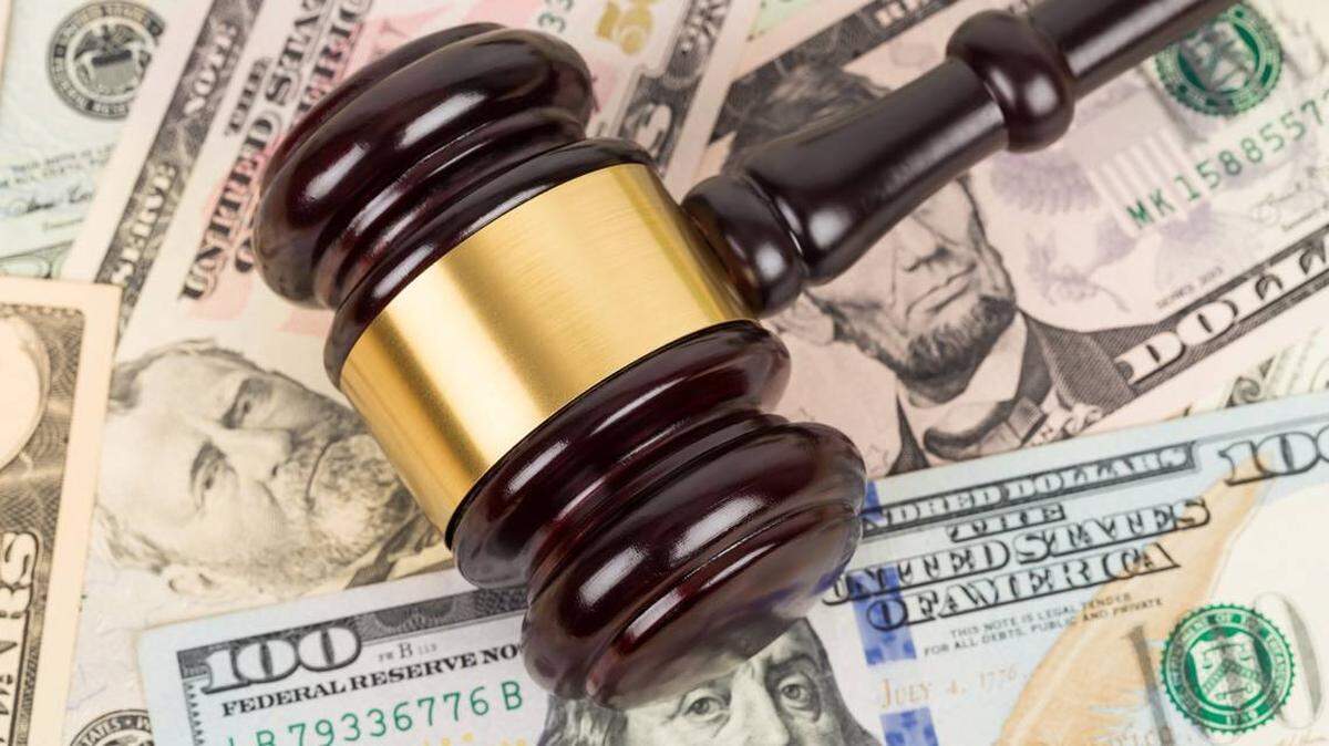 Two men are accused of stealing nearly $1 million in checks from Michigan mailboxes.