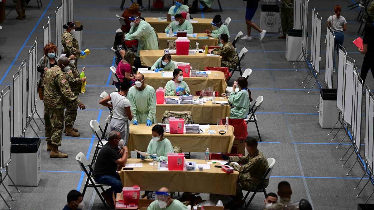 Healthcare workers received the COVID-19 vaccine at the Pedrín Zorrilla Colliseum in San Juan, Puerto Rico, on Dec. 30, 2020.