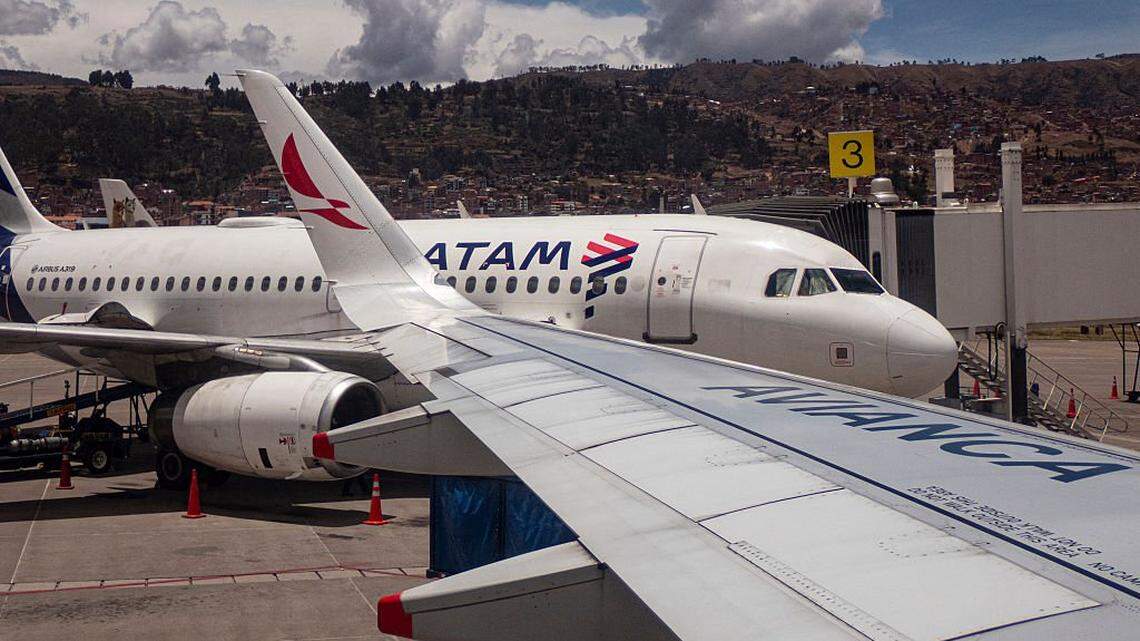 A LATAM Airlines aircraft is seen at Alejandro Velasco Astete International Airport in Cusco, Peru, on October 13, 2025. (Photo by MARTIN BERNETTI / AFP) (Photo by MARTIN BERNETTI/AFP via Getty Images)