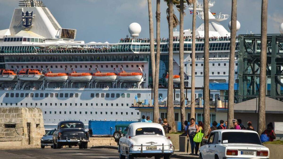 The "Empress of the Seas", a Bahamas-flagged vessel owned by the US Royal Caribbean which became the last cruise of a US company to touch the Cuban port following the new US sanctions against the island, leaves from Havana, on June 5, 2019. The Trump administration clamped down on US tourist visits to Cuba on June 4, aiming to cut the flow of dollars to a country that Washington accuses of helping prop up Venezuelan President Nicolas Maduro. The Treasury Department banned group educational travel, cruise ship and private yacht visits by Americans, taking aim at the most common ways US tourists and Cuban-Americans visit the Caribbean island. (Photo by ADALBERTO ROQUE / AFP) (Photo by ADALBERTO ROQUE/AFP via Getty Images)