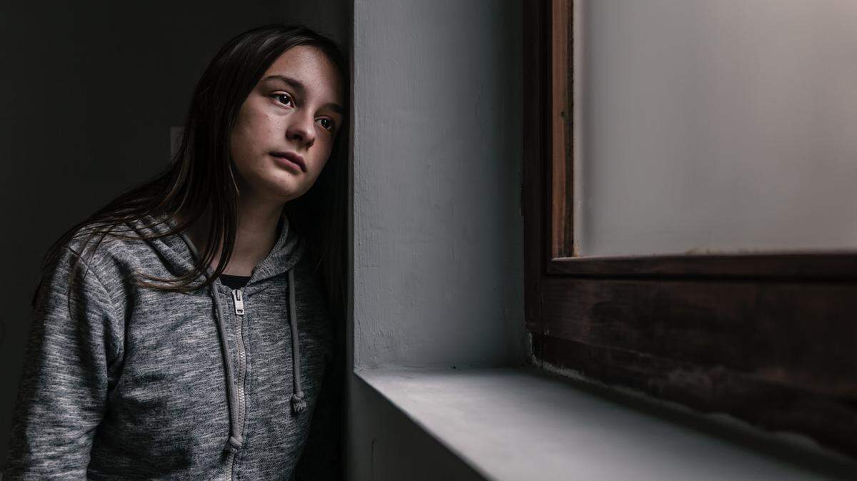 Sad and contemplative young woman.