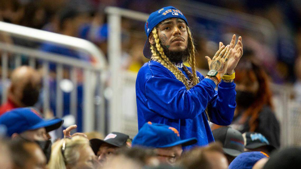 New York-born rapper Tekashi 6ix9ine reacts to the New York Mets losing to the Miami Marlins 5-4 at loanDepot park in the Little Havana neighborhood of Miami, Florida, on Tuesday, Aug. 3, 2021.
