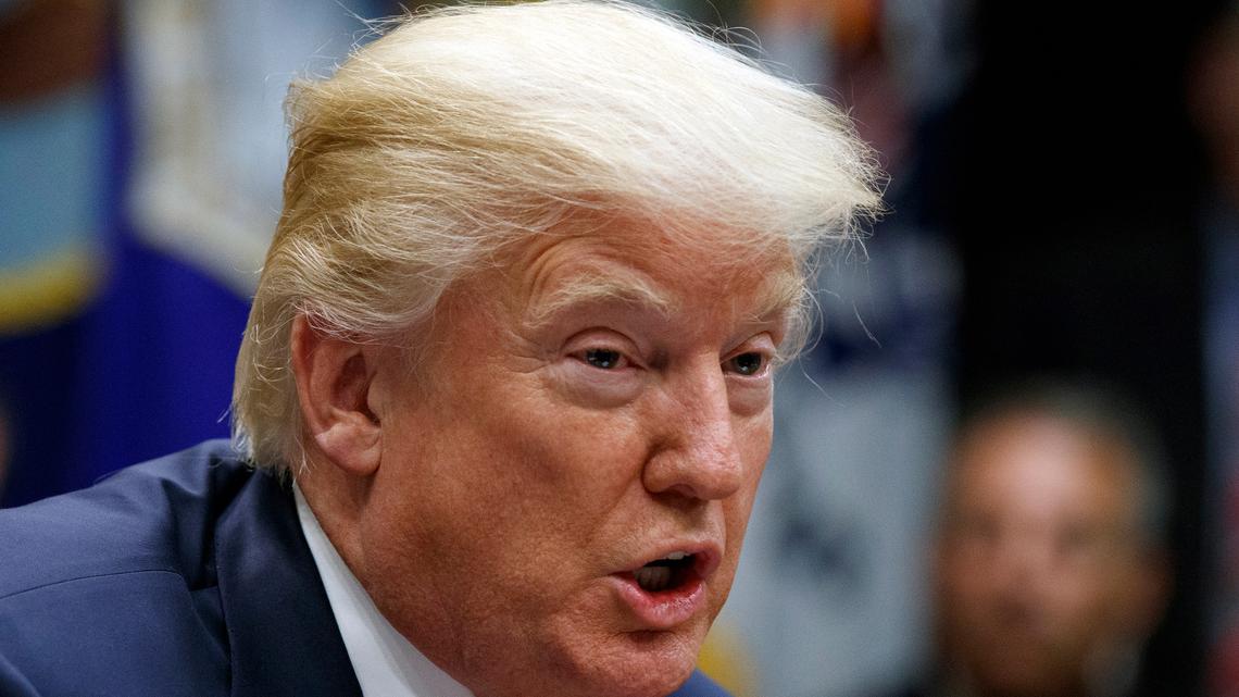 In this Tuesday, Oct. 31, 2017, photo, President Donald Trump speaks during a meeting in the Roosevelt Room of the White House in Washington. Trump is calling for “Merit Based immigration” following the truck attack in New York City that killed eight people and injured 11.