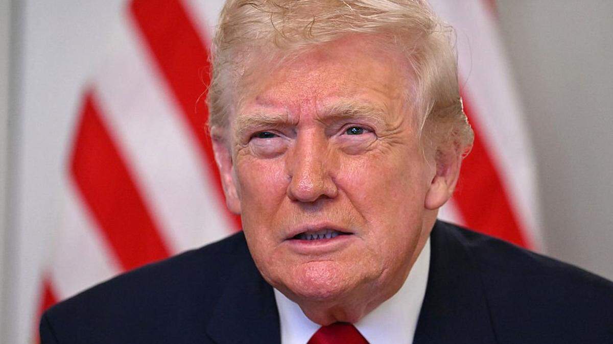 US President Donald Trump participates in a video call with military service members from his Mar-a-Lago residence in Palm Beach, Florida, on November 27, 2025, during the Thanksgiving holiday. US President Donald Trump said Thursday that Sarah Beckstrom, one of the two National Guard troops shot a day earlier near the White House, had died, while the other soldier was "fighting for his life." (Photo by Jim WATSON / AFP via Getty Images)