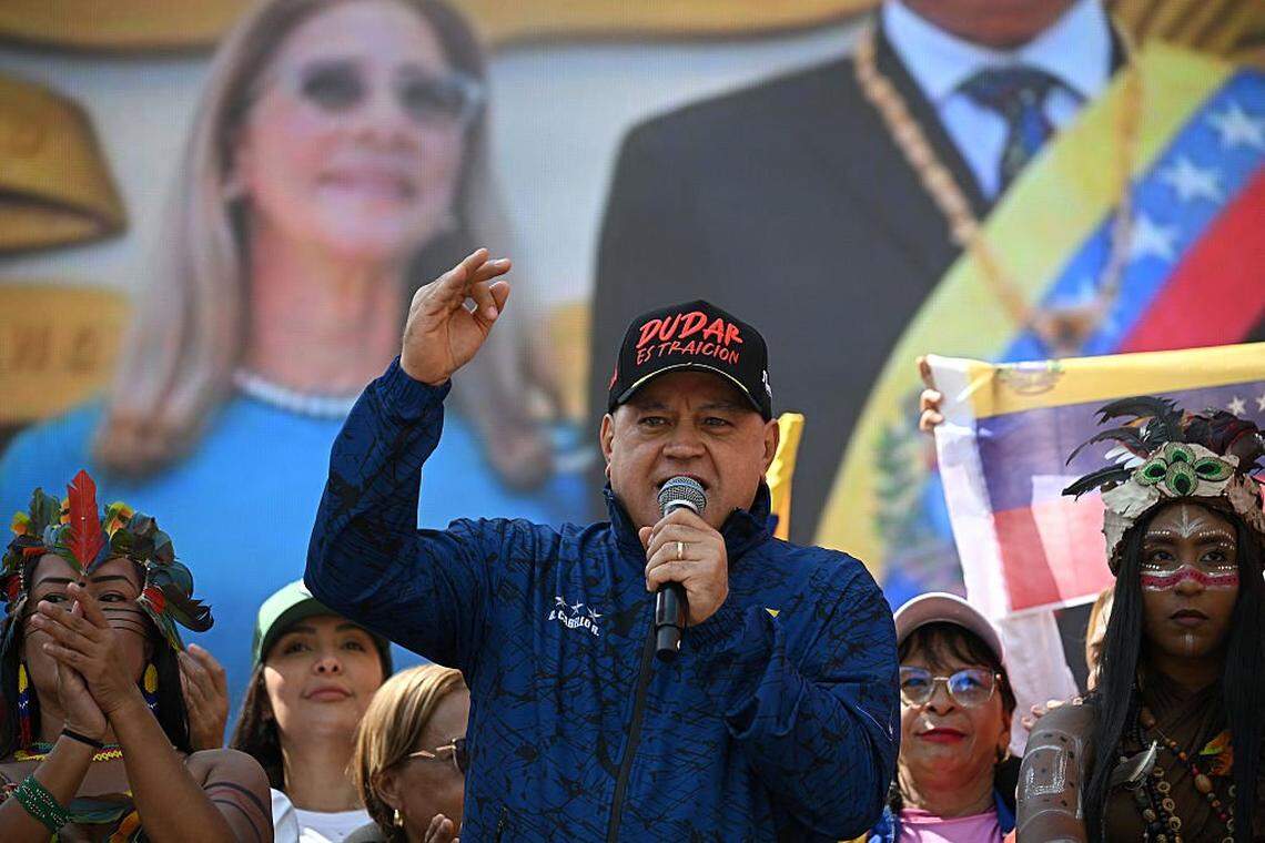 Venezuela's Minister of Interior Diosdado Cabello delivers a speech during a women's rally in support of ousted Venezuela's President Nicolas Maduro and his wife Cilia Flores in Caracas on January 6, 2026. US forces killed 55 Venezuelan and Cuban military personnel during their stunning raid to capture Nicolas Maduro, tolls published by Caracas and Havana showed January 6. (Photo by Federico PARRA / AFP via Getty Images)