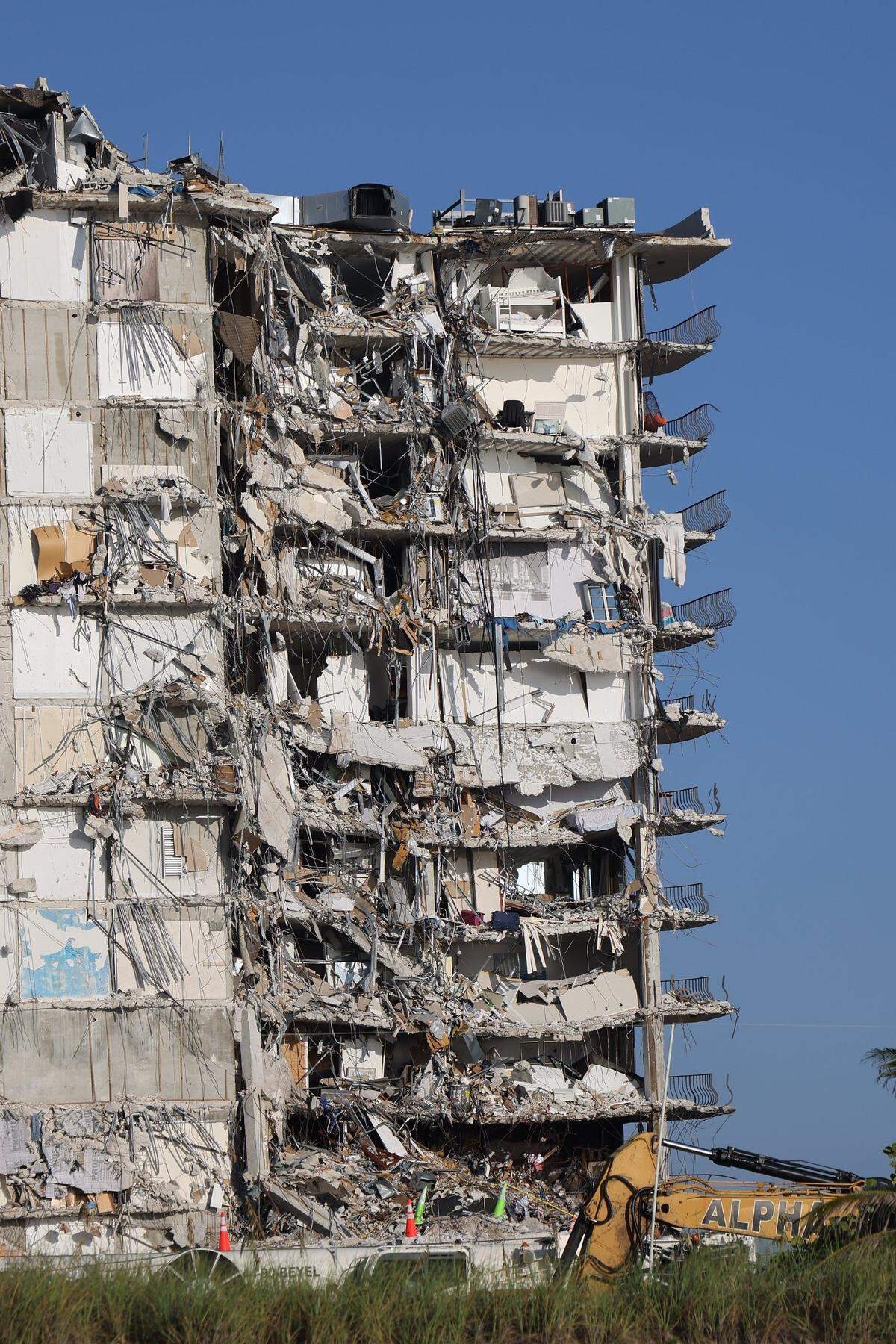 A standing portion of the collapsed Champlain Towers South building before it was intentionally razed to aid in search and recover efforts.