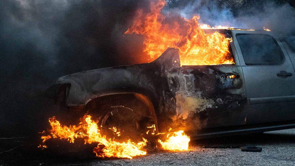 A Vehicle seen burning down during the Palisades Fire. Palisades Fire burning through Pacific Palisades, California forcing thousands to evacuate. Fueled by Santa Ana winds the fire currently sits at 1,260 acres and remains 0% contained. (Photo by Jon Putman / SOPA Images/Sipa USA)