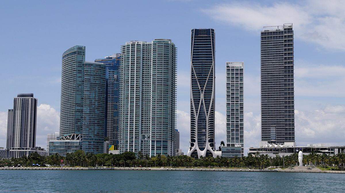 Miami Skyline view including the One Thousand Museum building (third from right) by the late Architect, Zaha Hadid. David and Victoria Beckham sold their luxury penthouse in the building for nearly $25 million. 