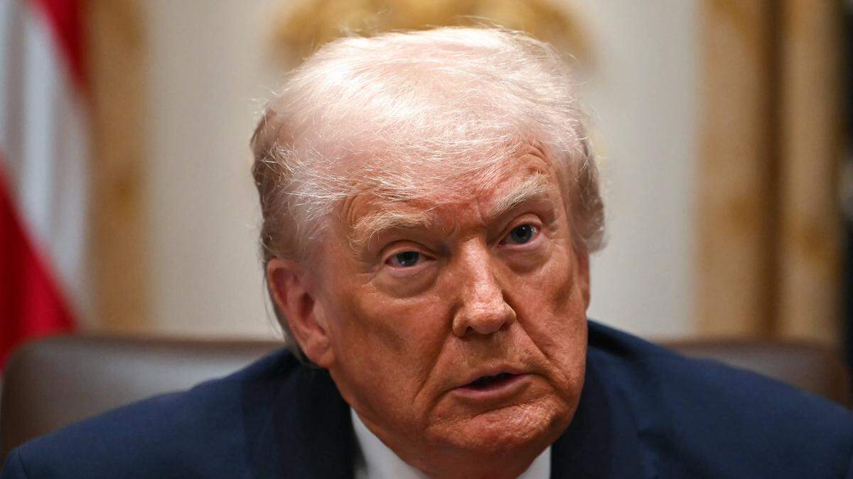 US President Donald Trump speaks during a Cabinet Meeting in the Cabinet Room of the White House in Washington, DC on December 2, 2025. (Photo by ANDREW CABALLERO-REYNOLDS / AFP via Getty Images)