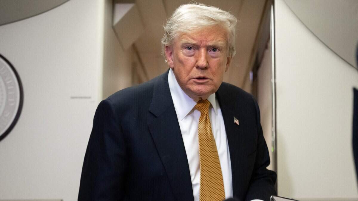US President Donald Trump speaks with the media aboard Air Force One shortly after departure from Mildenhall Air Force Base in the United Kingdom, after he switched from the old VC-25A Air Force One to the newer VC-25B Bridge Air Force One, enroute to Washington, on July 8, 2026. Trump is returning from the NATO Summit in Turkey. (Photo by SAUL LOEB / AFP via Getty Images)
