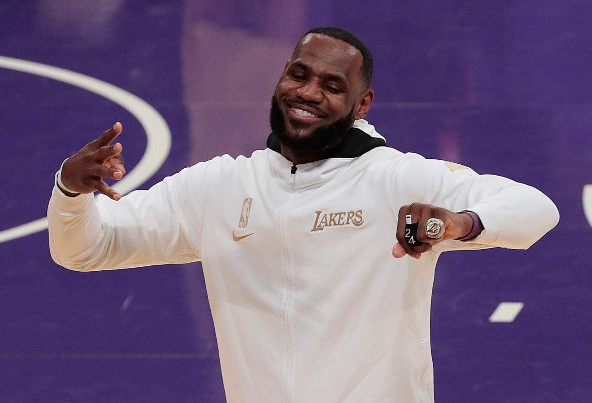 The Los Angeles Lakers’ LeBron James celebrates after receiving his championship ring during a ceremony before a game against the Los Angeles Clippers at Staples Center in Los Angeles. On Thursday, Jan. 21, 2021, in Milwaukee, James collected 34 points, eight assists and six rebounds to pace a 113-106 win against the Bucks and MVP Giannis Antetokounmpo. (Robert Gauthier/Los Angeles Times/TNS)
