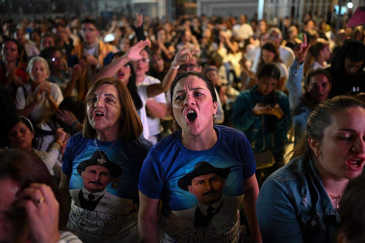 Catholic faithfuls gather at La Candelaria Square to attend the canonization ceremony of Venezuelan doctor Jose Gregorio Hernandez and Venezuelan Sister Maria Rendiles in Caracas on October 19, 2025. (Photo by Federico PARRA / AFP) (Photo by FEDERICO PARRA/AFP via Getty Images)
