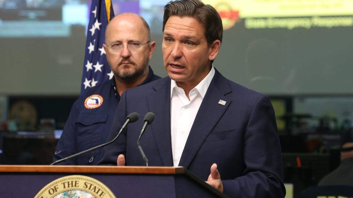 Florida Gov. Ron DeSantis, right, and Kevin Guthrie, executive director of the Florida Division of Emergency Management, provide an update about Tropical Storm Idalia at the State Emergency Operations Center in Tallahassee on Sunday, Aug. 27, 2023.