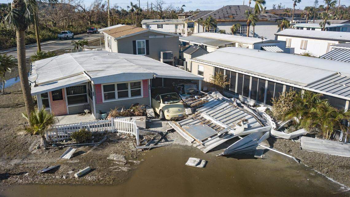 A mobile home in the Iona community in Fort Myers on Sunday, October 2, 2022, damaged by the storm surge caused by Hurricane Ian struck the area.