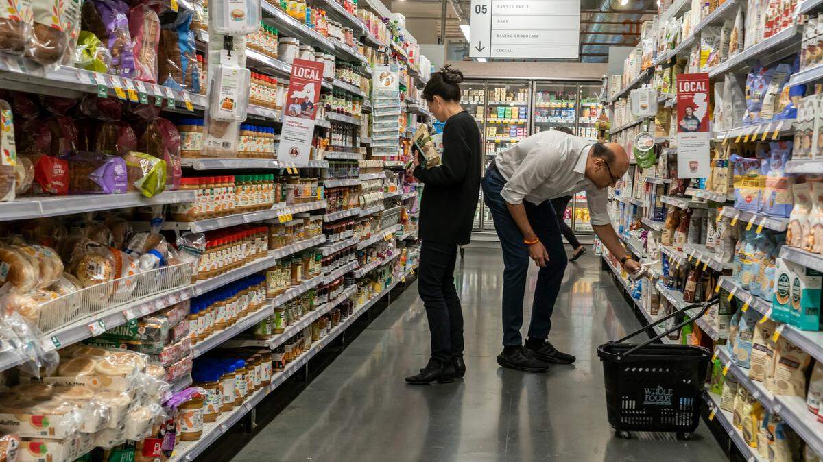 Shopping in a Whole Foods Market supermarket in New York on Thursday, October 5, 2023. (Photo by Richard B. Levine)