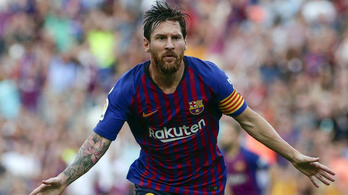 Lionel Messi celebra tras anotar un gol con Barcelona ante el Huesca, en un partido de la liga española, celebrado el 2 de septiembre de 2018.