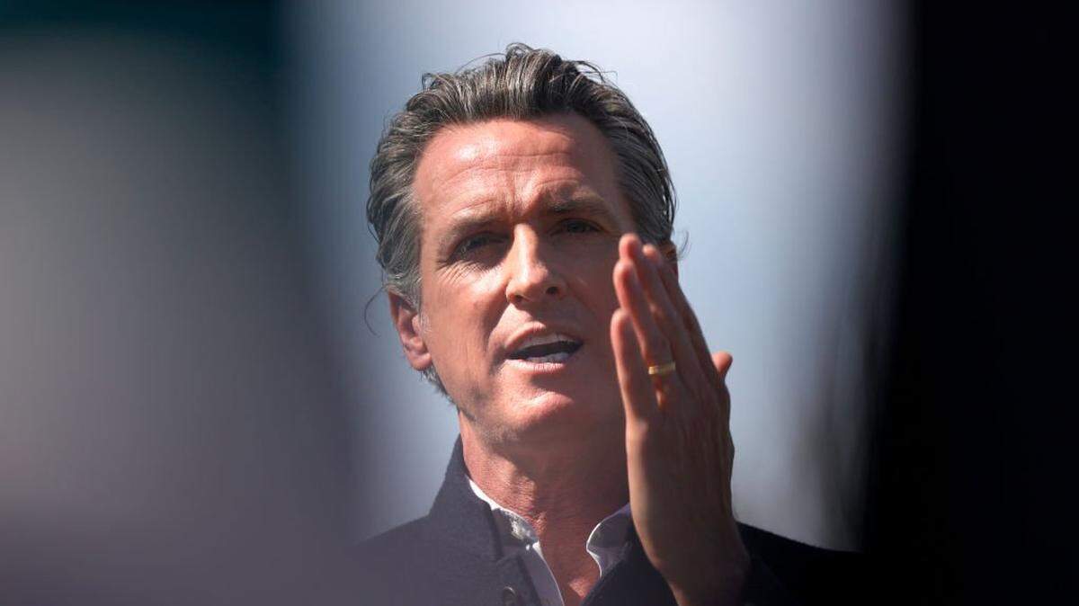 PALO ALTO, CALIFORNIA - MARCH 02: California Gov. Gavin Newson speaks during a news conference after touring Barron Park Elementary School on March 02, 2021 in Palo Alto, California. California Gov. Gavin Newsom visited a reopened elementary school a day after he announced a $6.6 billion school reopening agreement with the State legislature. (Photo by Justin Sullivan/Getty Images)