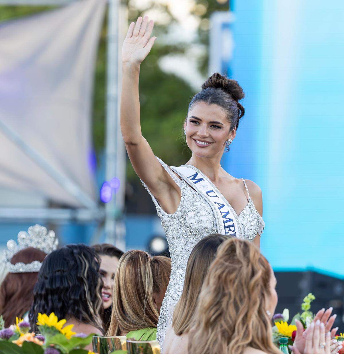 Miss Universe Peru 2024 Tatiana Calmell del Solar waves to the crowd during the Miss Universe Cuba 2025 pageant at Milander Park on Tuesday, July 8, 2025, in Hialeah, Fla.