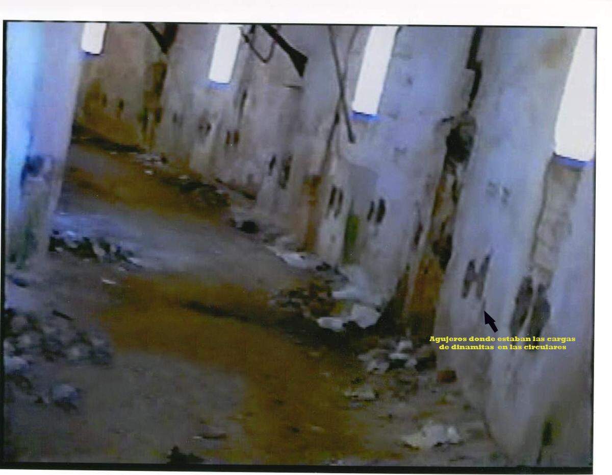 TONELADAS DE dinamita habían sido depositadas en el sótano de la prisión.  La explosión hubiera arrasado también con áreas pobladas.