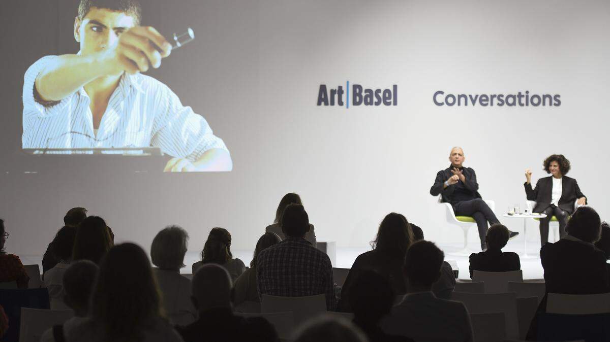 Art Basel Global Director Marc Spiegler, seated on stage at left, moderates a 2020 panel on the impact of the COVID-19 pandemic on the industry.