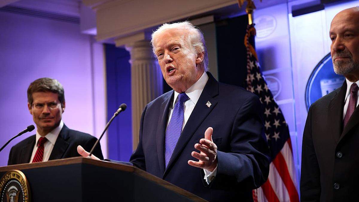 WASHINGTON, DC - FEBRUARY 20: U.S. President Donald Trump speaks during a press briefing held at the White House February 20, 2026 in Washington, DC. The U.S. Supreme Court today ruled against Trump's use of emergency powers to implement international trade tariffs, a central portion of the administration's core economic policy. Also pictured on stage (L-R) Solicitor General John Sauer and Secretary of Commerce Howard Lutnick. (Photo by Kevin Dietsch/Getty Images)