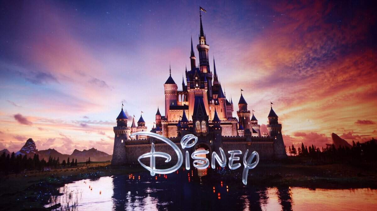 The Walt Disney logo is displayed on screen during the Walt Disney Studios presentation at The Colosseum at Caesars Palace at CinemaCon 2025 in Las Vegas, Nevada, on April 3, 2025. (Photo by VALERIE MACON / AFP) (Photo by VALERIE MACON/AFP via Getty Images)
