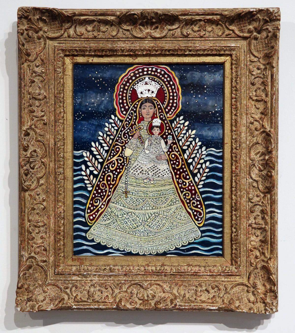 ‘Nuestra Señora de la Caridad’, pintura de Margarita Cano en Saladrigas Gallery en Belen Jesuit Preparatory School.
