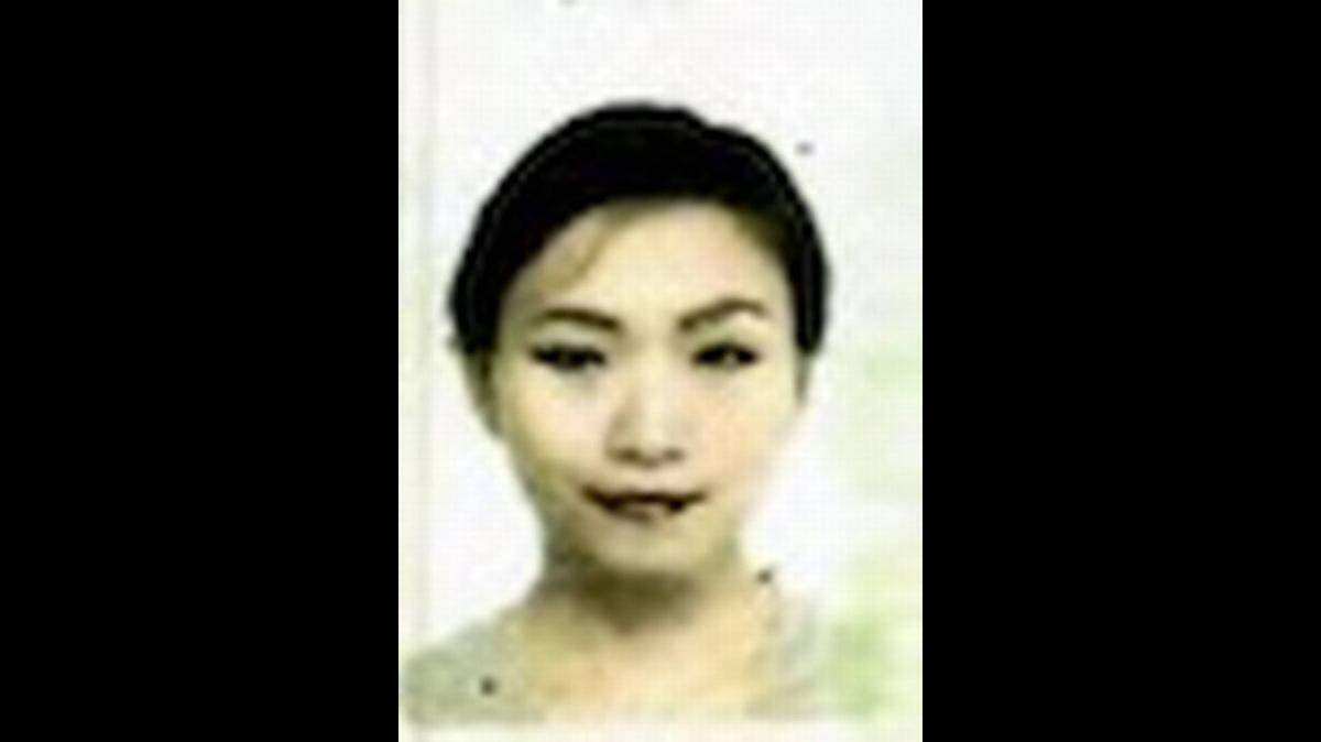 Foto de pasaporte de Yujing Zhang.