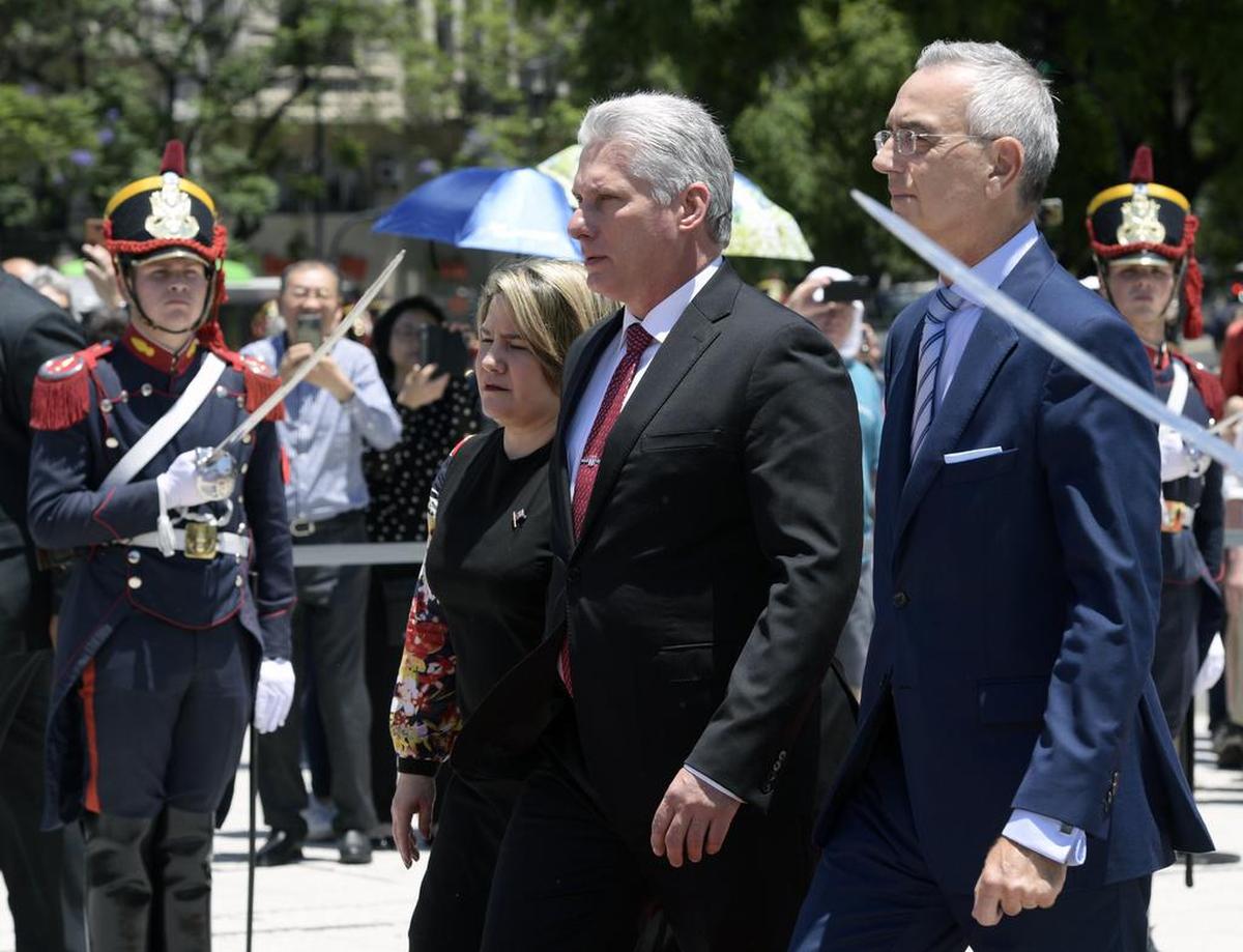 Cuba leader Miguel Díaz-Canel and his wife, Lis Cuesta, at a ceremony in Argentina in 2019.