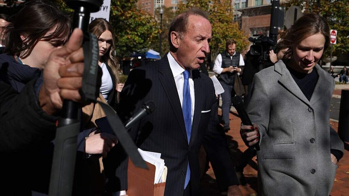 ALEXANDRIA, VIRGINIA - NOVEMBER 13: Abbe Lowell (C), attorney for former FBI Director James Comey, and New York Attorney General Letitia James, leave the Albert V. Bryan United States Courthouse on November 13, 2025 in Alexandria, Virginia. The court is hearing oral argument challenging the appointment of U.S. Attorney for the Eastern District Lindsey Halligan, who signed the indictments against former FBI Director James Comey and New York Attorney General Letitia James, was illegitimate. (Photo by Alex Wong/Getty Images)